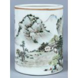 Chinese enameled porcelain brush pot, featuring a qianjiangcai landscape with boats on the river and