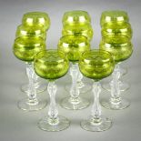 (lot of 11) Continental crystal stemware, chartreuse green to clear, with gilt and etched accents,