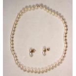 Cultured pearl and yellow gold jewelry suite Including 1) 7.4 mm, cultured pearl and 14k yellow