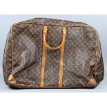 (lot of 2) Louis Vuitton luggage group, consisting of a soft shell garment bag, together with a