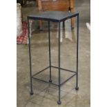 Moderne plant stand, having a slate top over the black painted metal frame, 22"h x 9.5" x 9.5"d