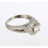 Diamond and 14k white gold ring Centering (1) round brilliant-cut diamond, weighing 0.91 ct.,