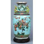 Chinese enameled porcelain vase, featuring a scholar, officials and children on a garden terrace