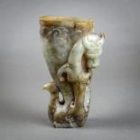 Chinese jade rhyton cup, in the form of a phoenix and carved with a chilong in high relief, executed