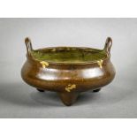 Chinese gilt splashed bronze censer, with inverted u-shaped handles on the rim of the compressed