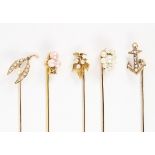 (Lot of 5) Diamond, cultured pearl and yellow gold stickpins Including (1) imitation pearl, seed