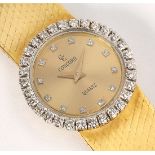 Lady's Concord diamond and 18k yellow gold wristwatch Dial: round, gold, textured, applied diamond