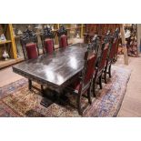 (lot of 7) Renaissance style banquet table and chairs, the large table having an ebonized surface