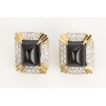 Pair of black onyx, diamond and 14k yellow gold earrings Featuring (2) black onyx sugar loafs,