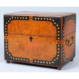 Continental marquetry decorated tantalus circa 1860, having a hinged lid opening to the fitted