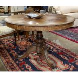 Federal style breakfast table, the circular top resting on a turned standard and rising on a