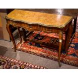 Louis XV style console table, having a shaped parquetry decorated top, above three drawers, and