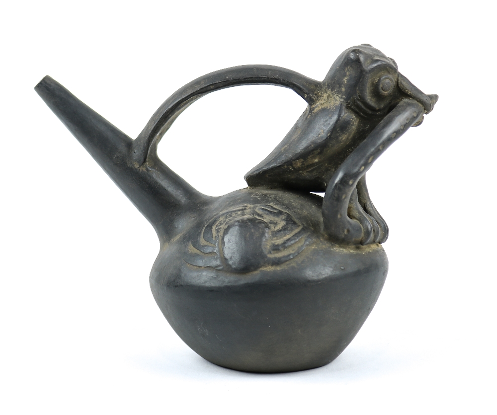 Chimu blackware effigy stirrip vessel, Northern Peru, Early Chimu (pre 1200 A.D.), an owl holding - Image 2 of 2