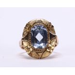 Synthetic spinel and 14k yellow gold ring Centering (1) oval synthetic spinel, weighing