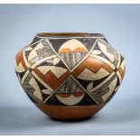 Acoma pottery olla or water jar, early 20th century, having a shouldered form with a geometric paint