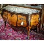 Louis XV style bombe commode, having a shaped marble top, above the two drawer case, and rising on