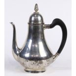Tiffany and Co. sterling silver coffee pot, the lid having a pinecone final above the bulbous