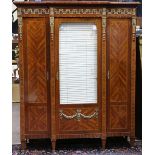 French Neoclassical style parquetry decorated vitrine, with brass mounts, having a shaped top, above