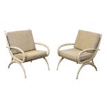 Pair of Arthur Court lounge chairs, each having a taupe seat and back, above antler form arms,