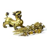 (lot of 4) Chinese alloy metal decorative items: consisting of a qilin in stance; together with