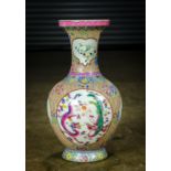 Chinese enameled porcelain pink ground vase, with a pair of dragon and phoenix roundels alternated