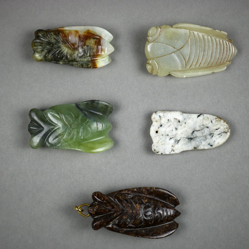 (lot of 5) Chinese hardstone toggles/plaques, four of stylized cicada form; the other of a blade - Image 2 of 2