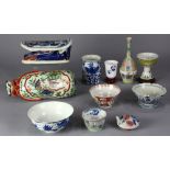 (lot of 11) Group of Chinese and Japanese porcelains: including one underglaze blue and red