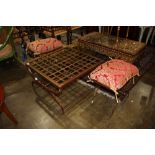 (lot of 3) Gilt polychrome decorated table and two stools, each having a metal support and rising on