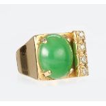 Jadeite, diamond and 18k yellow gold ring Featuring (1) jadeite cabochon, measuring approximately