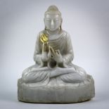 Burmese marble Buddha, seated on a pedestal in dharamachakra mudra, heightened with gilt accents,