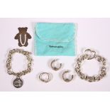 (Lot of 5) Sterling silver and silver jewelry Including 1) pair of Tiffany and Co. sterling silver
