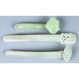 (lot of 3) Chinese jade and hardstone hairpins, two of ruyi scepter form; the other pierced with a