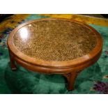 Chinese hardwood table, the top set with Chinese coins under the glass, with a bead edge apron and