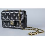 Chanel style quilted handbag,