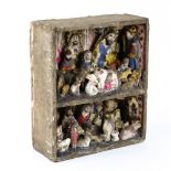 Rural Peruvian retablo, plaster veneered, the double storied wooden box filled with many saints,