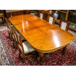 (lot of 7) Victorian walnut dining suite, the table having a rectangular top with two leaves and