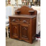 Victorian Eastlake children's wash stand, the single drawer rising above the two door case, above