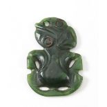 Maori or Maori-style nephrite pendant, traces of red in the eyes, flat and glossy-smooth back but