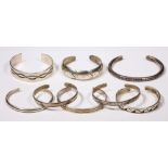 (Lot of 8) Sterling silver, silver and metal bracelets Including 1) 14k yellow gold sterling