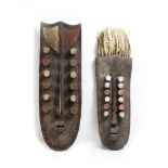 (lot of 2) Decorative African masks, in the style of Grebo or Kru, Liberia, largest: 27"l