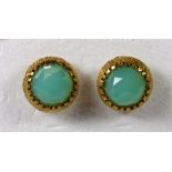 Pair of chalcedony and yellow gold earrings Featuring (2) round faceted top green chalcedony