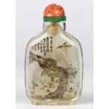 Chinese rock crystal inside-painted snuff bottle, one side depicting a bird above a pine and