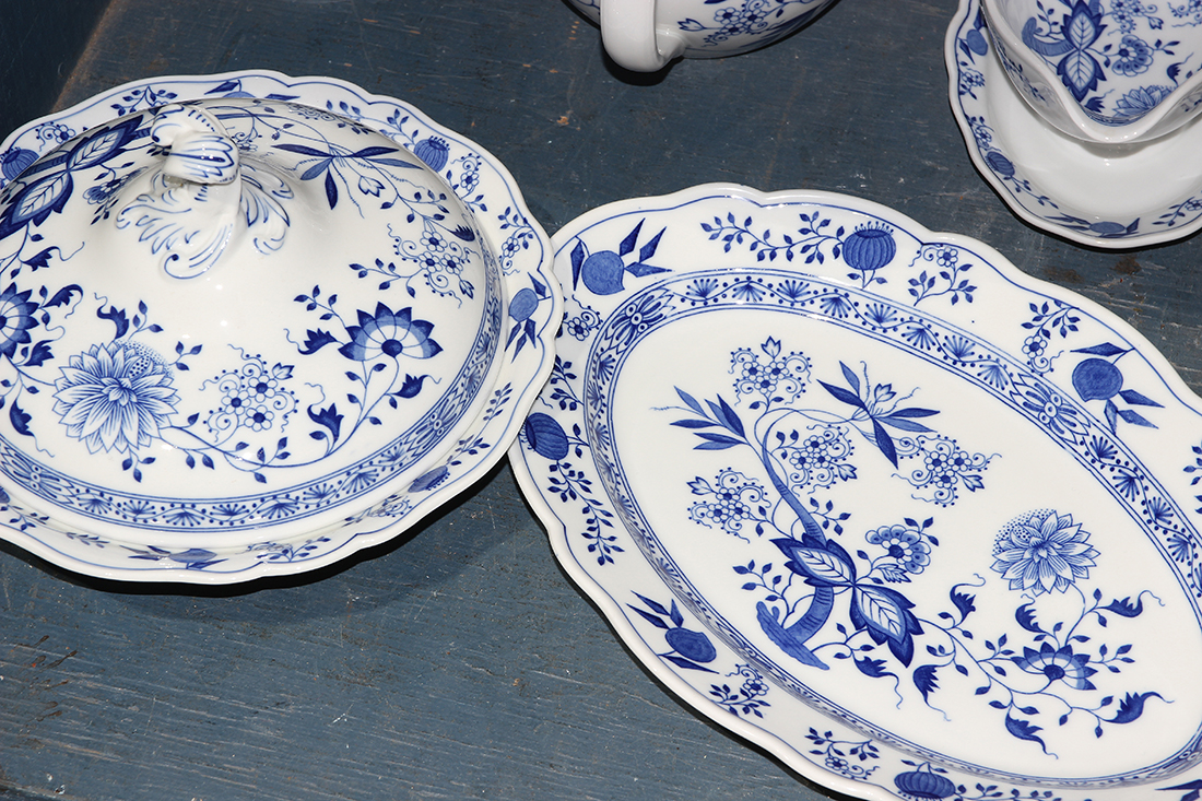 One shelf of a partial Bavarian porcelain table service, in the style of Meissen's "Blue Onion" - Image 2 of 2