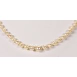 Cultured pearl and silver necklace Composed of (99) graduated cultured pearls, ranging in size