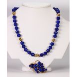 Lapis lazuli and 14k yellow gold jewelry suite Including 1) lapis lazuli bead, measuring