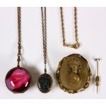 (Lot of 3) Lava, plastic, metal, gold-filled jewelry Including 1) lava cameo and gold-filled