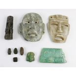 (lot of 9) Modern Olmec style stone masks, maskettes, and beads, largest: 6.75"h