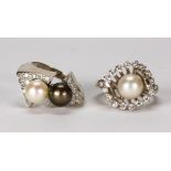 (Lot of 2) Cultured pearl, diamond and 14k white gold rings Including 1) 7.5 mm cultured pearl,