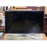 Samsung flat screen TV with stand, 46", manufactured 2013