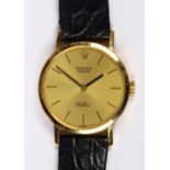 Lady's Rolex Cellini 18k yellow gold wristwatch Dial: round, champagne, sunburst texture, applied